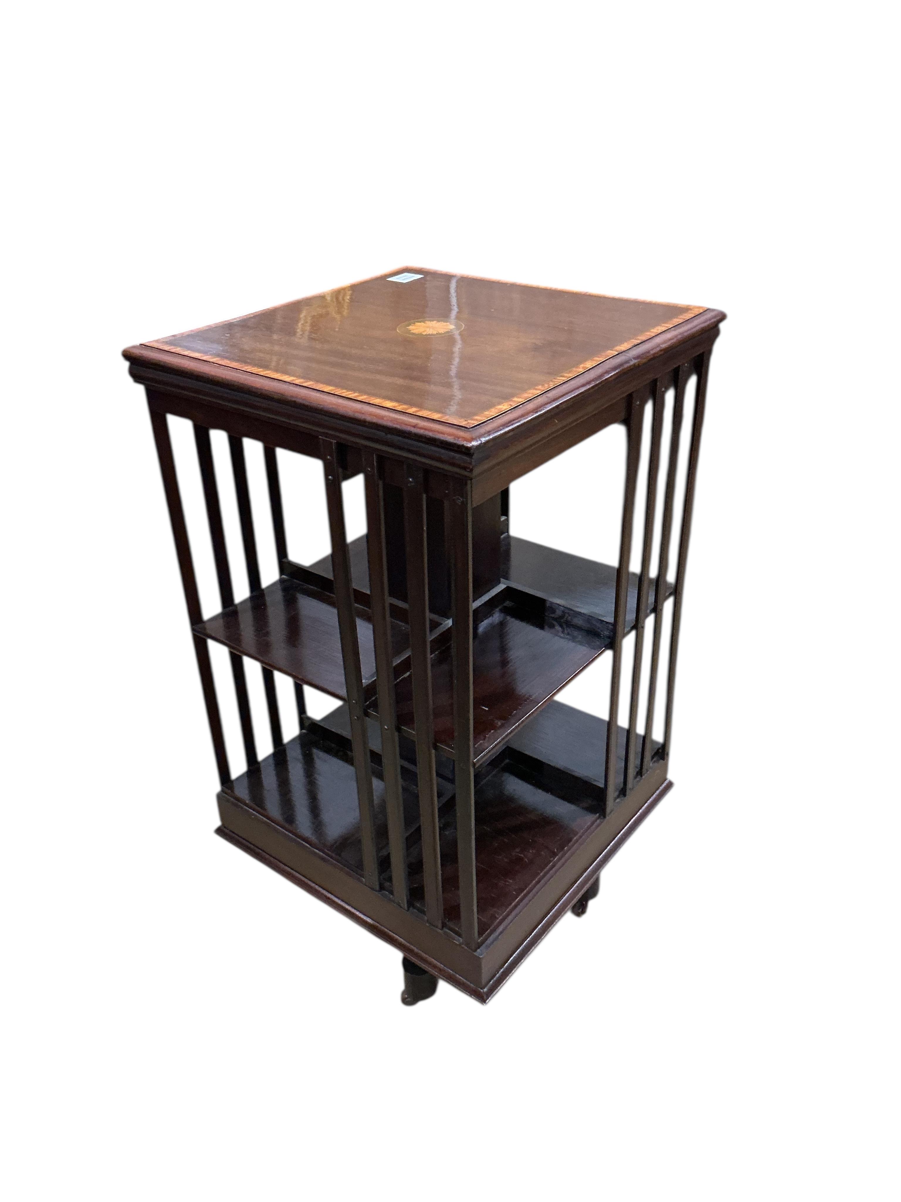 An Edwardian satinwood banded inlaid mahogany revolving bookcase, width 48cm, depth 48cm, height 87cm